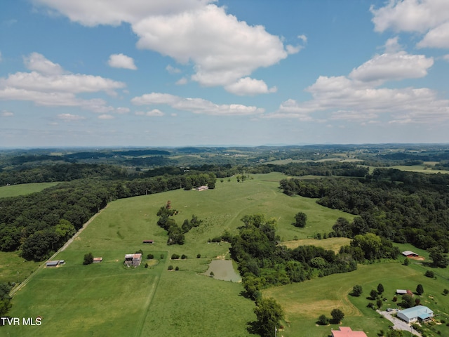 birds eye view of property featuring a rural view