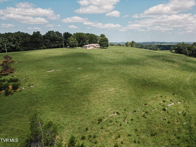 birds eye view of property featuring a rural view