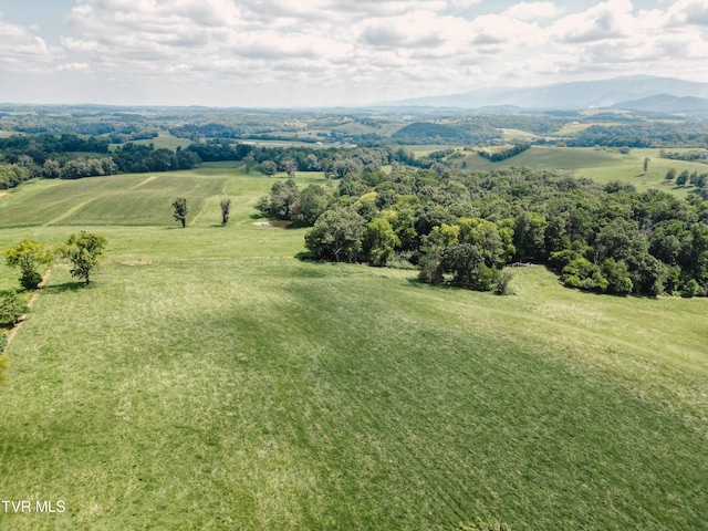 bird's eye view with a rural view and a mountain view