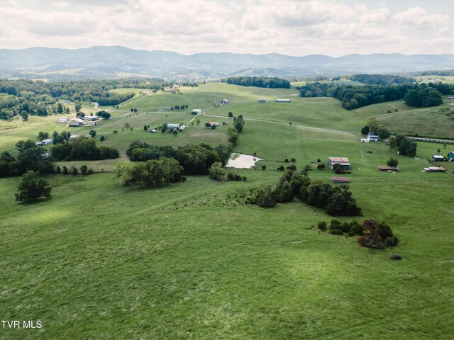 bird's eye view with a mountain view and a rural view