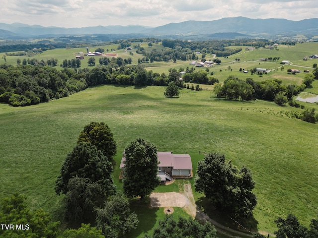 bird's eye view featuring a rural view and a mountain view