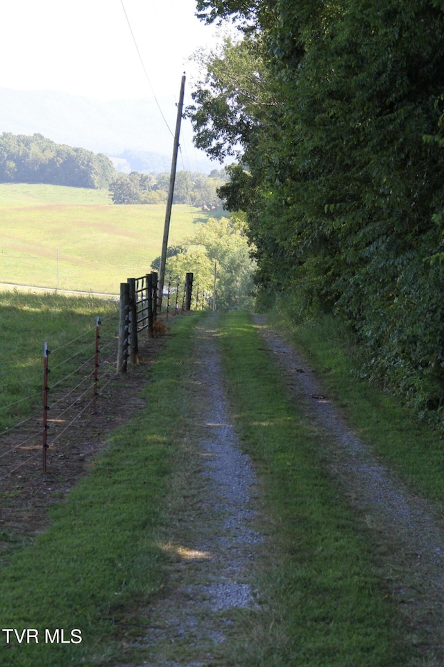 view of road with a rural view