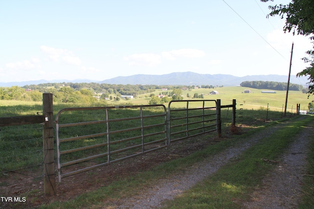 exterior space featuring a rural view and a mountain view