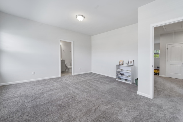 empty room with dark carpet