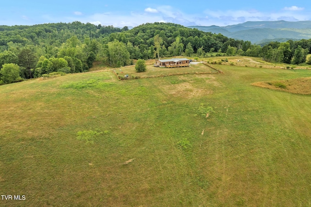 bird's eye view with a mountain view and a rural view