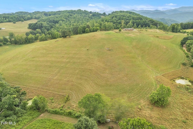 aerial view with a mountain view and a rural view