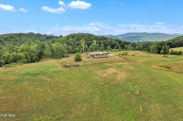 mountain view featuring a rural view