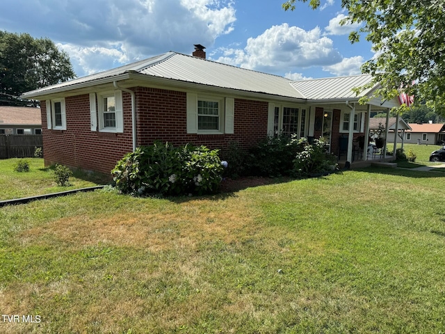 exterior space featuring a yard