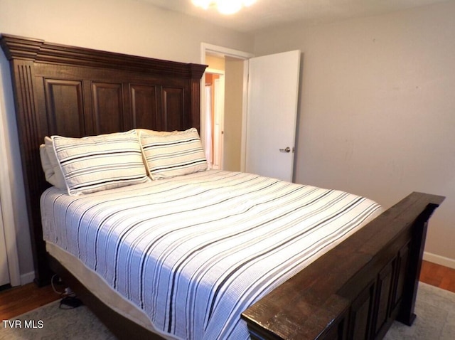 bedroom featuring hardwood / wood-style floors