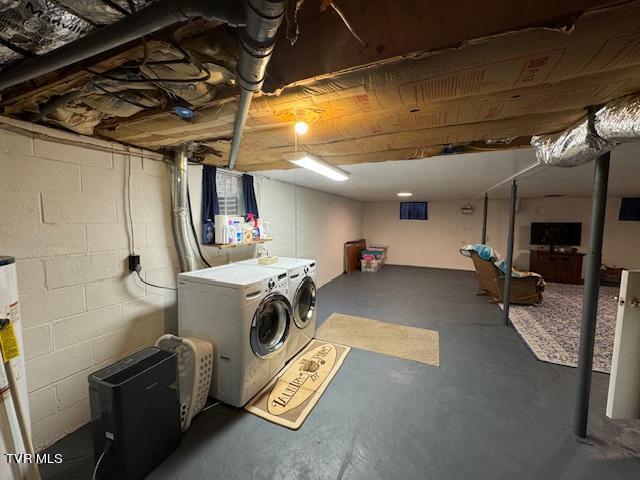 washroom with separate washer and dryer