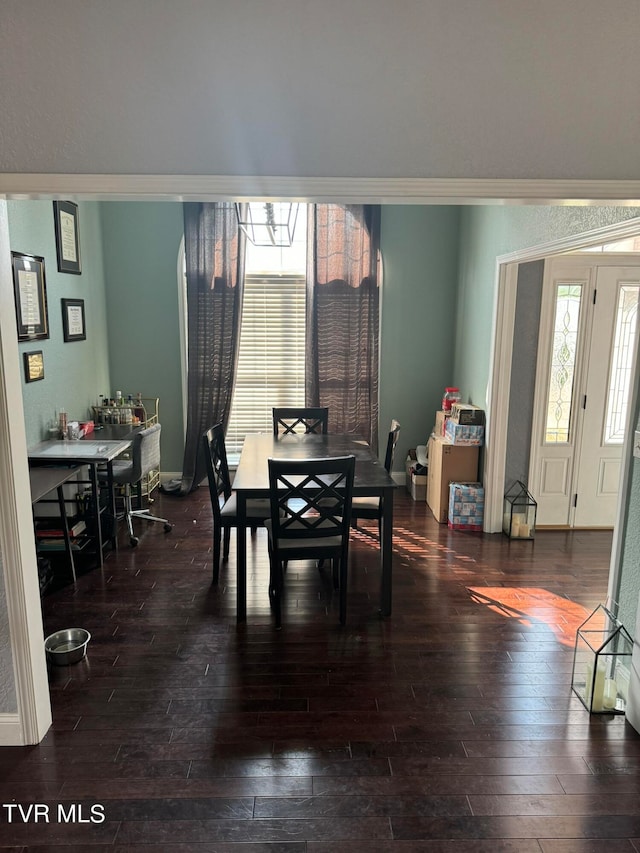 dining area featuring hardwood / wood-style flooring