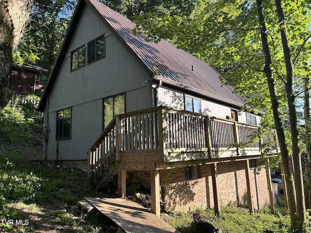 rear view of house with a deck