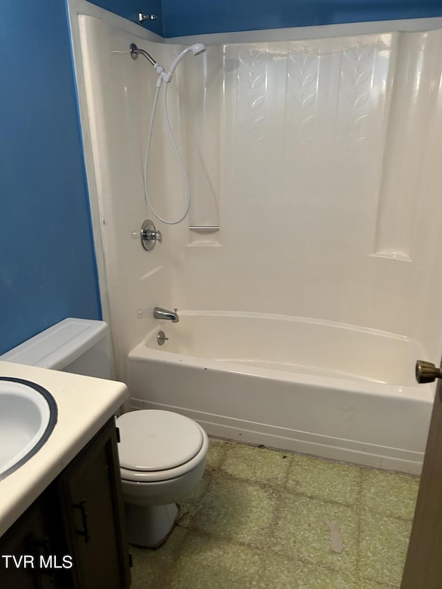 full bathroom with bathing tub / shower combination, vanity, and toilet