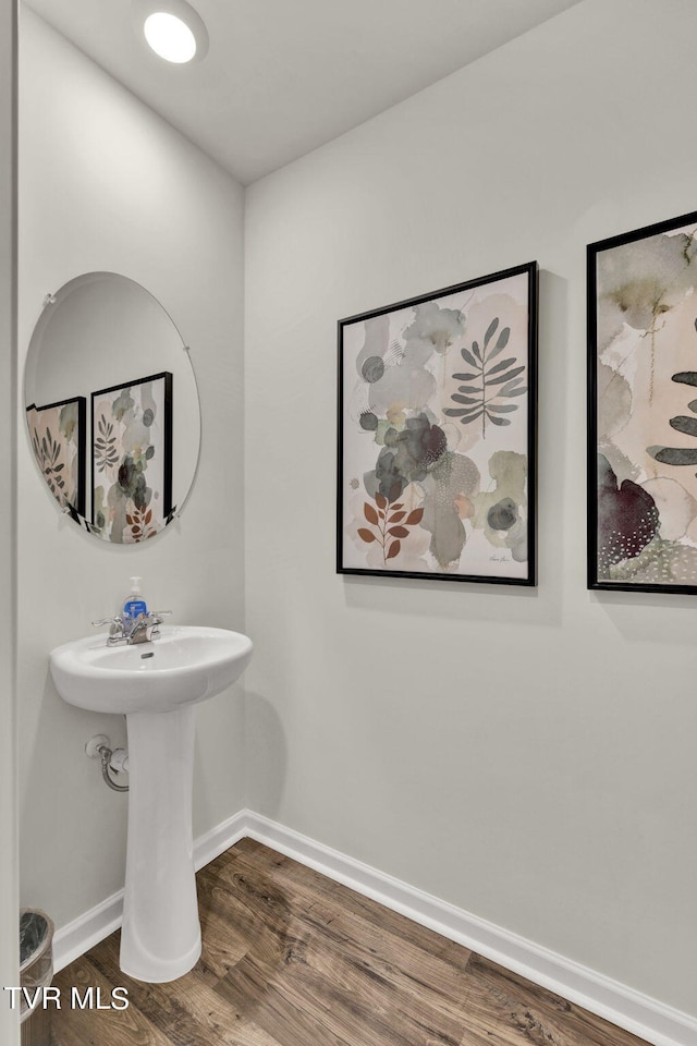 bathroom featuring hardwood / wood-style flooring