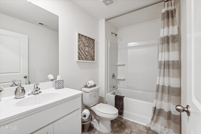 full bathroom with toilet, vanity, and shower / bath combo with shower curtain