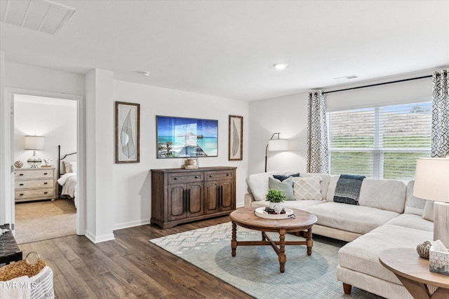 living room with dark hardwood / wood-style floors