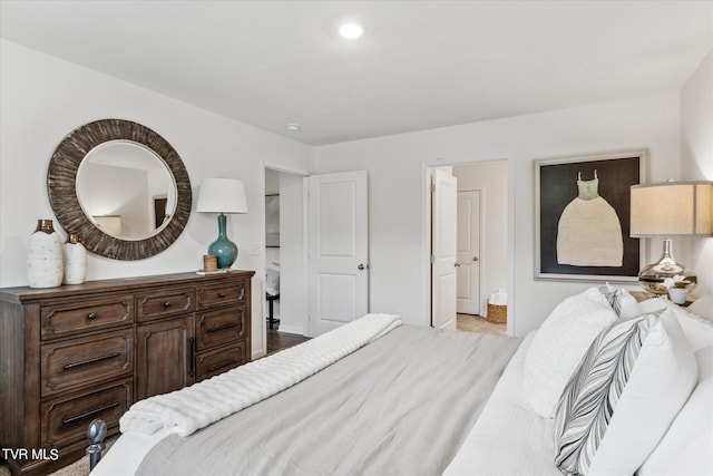 bedroom featuring ensuite bath