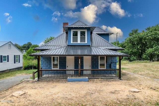 view of front of property featuring covered porch