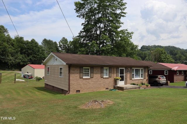 view of front of home with a front yard