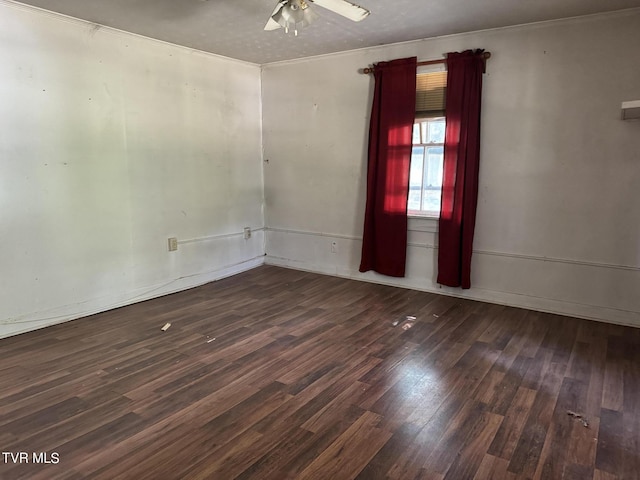 unfurnished room featuring ceiling fan, a textured ceiling, and dark hardwood / wood-style flooring