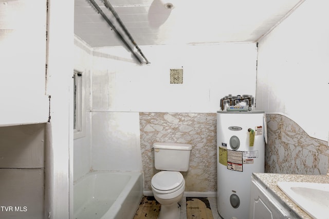 bathroom featuring water heater, a bathing tub, toilet, and vanity