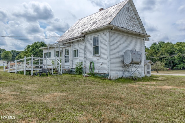 exterior space with a yard