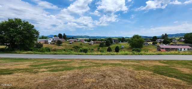 surrounding community featuring a mountain view