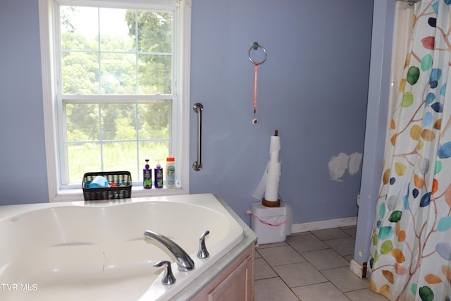 bathroom featuring walk in shower and tile patterned floors