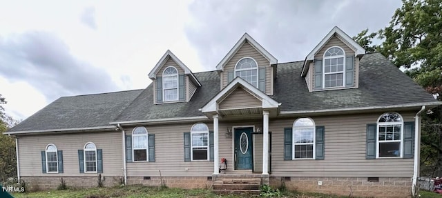 view of new england style home