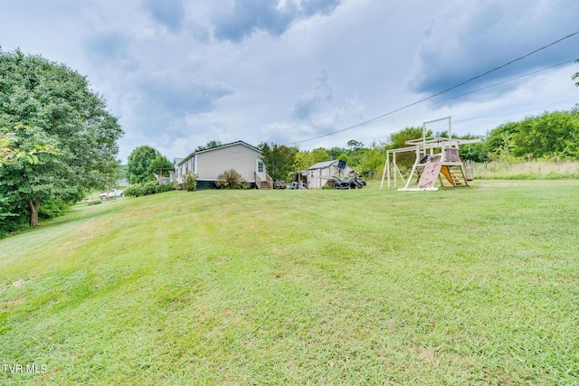 view of yard featuring a playground