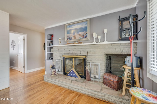 414 Beulah Church Dr, Kingsport, TN 37663 - living area with baseboards, a fireplace, and wood finished floors