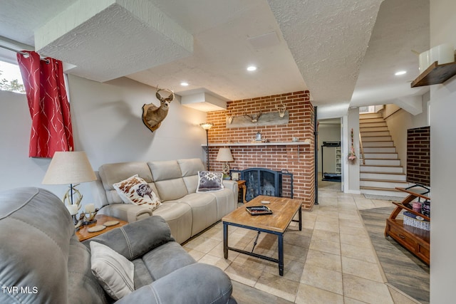 414 Beulah Church Dr, Kingsport, TN 37663 - living area featuring stairs, recessed lighting, a textured ceiling, tile patterned floors, and a brick fireplace