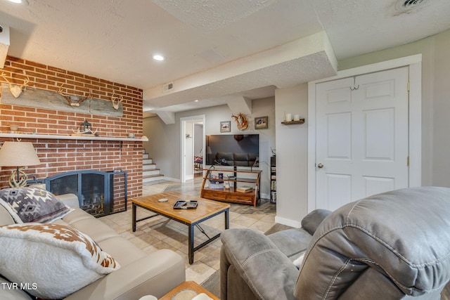 414 Beulah Church Dr, Kingsport, TN 37663 - living room with a brick fireplace, recessed lighting, baseboards, and a textured ceiling