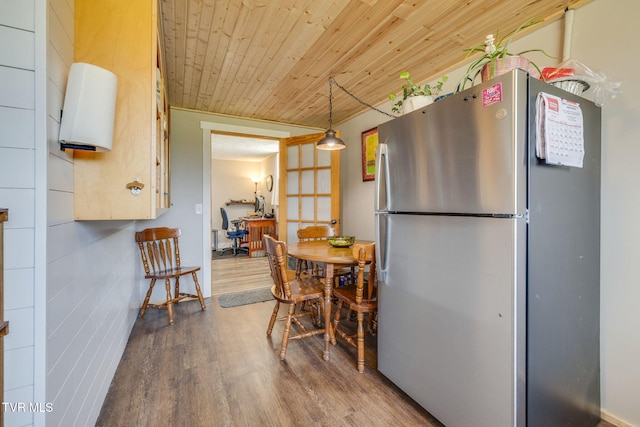 414 Beulah Church Dr, Kingsport, TN 37663 - kitchen with freestanding refrigerator, wood ceiling, pendant lighting, and wood finished floors