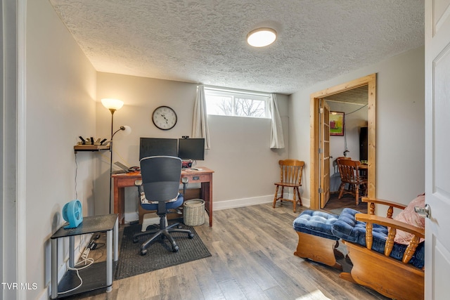 414 Beulah Church Dr, Kingsport, TN 37663 - office area featuring a textured ceiling, baseboards, and wood finished floors