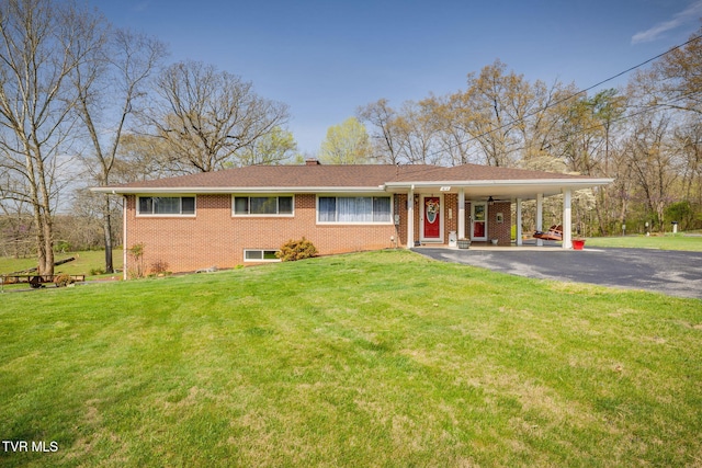 414 Beulah Church Dr, Kingsport, TN 37663 - ranch-style home featuring driveway, a chimney, brick siding, a front lawn, and a carport