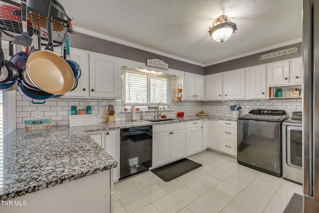 414 Beulah Church Dr, Kingsport, TN 37663 - kitchen with stone countertops, a sink, washing machine and dryer, and dishwasher