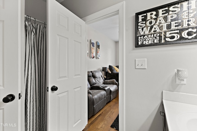 bathroom with vanity and hardwood / wood-style flooring