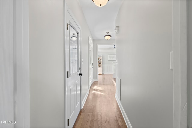 hallway featuring wood-type flooring