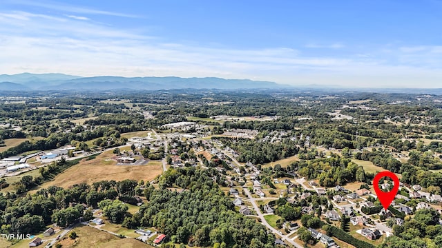 drone / aerial view featuring a mountain view