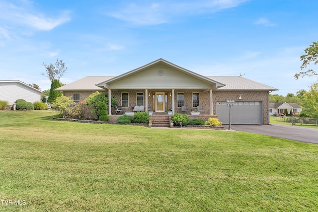 ranch-style house with a front lawn, a garage, and a porch