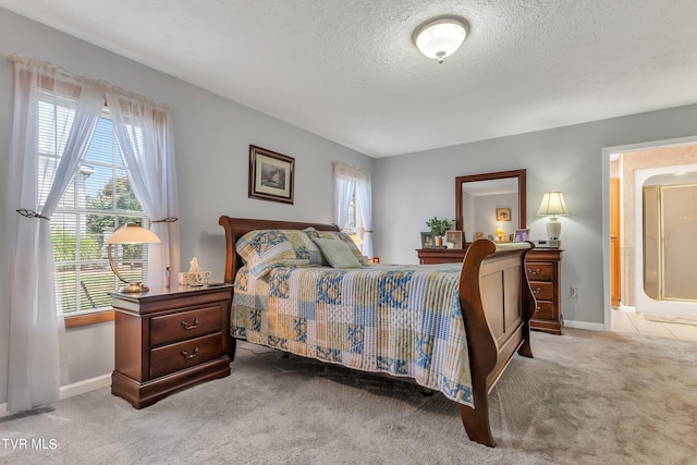 carpeted bedroom with a textured ceiling