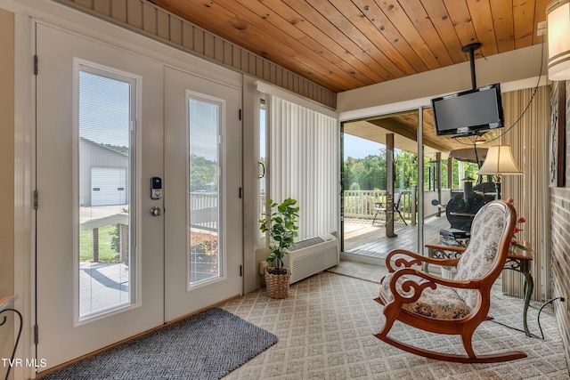 sunroom featuring wood ceiling, french doors, and cooling unit