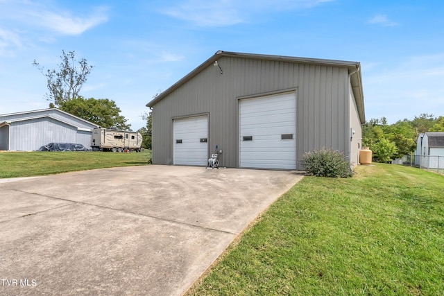 garage with a lawn