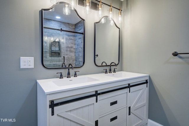 bathroom with vanity and a tile shower