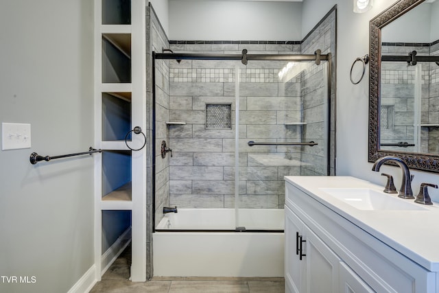 bathroom featuring shower / bath combination with glass door, tile patterned flooring, vanity, and built in features