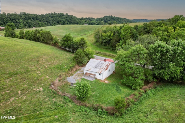 aerial view at dusk with a rural view