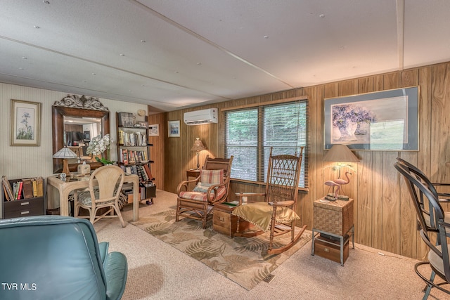 living room with wood walls, a wall mounted air conditioner, and carpet