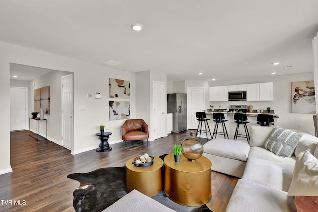 living room with dark wood-type flooring