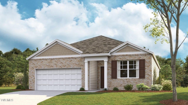 view of front facade with a front yard and a garage